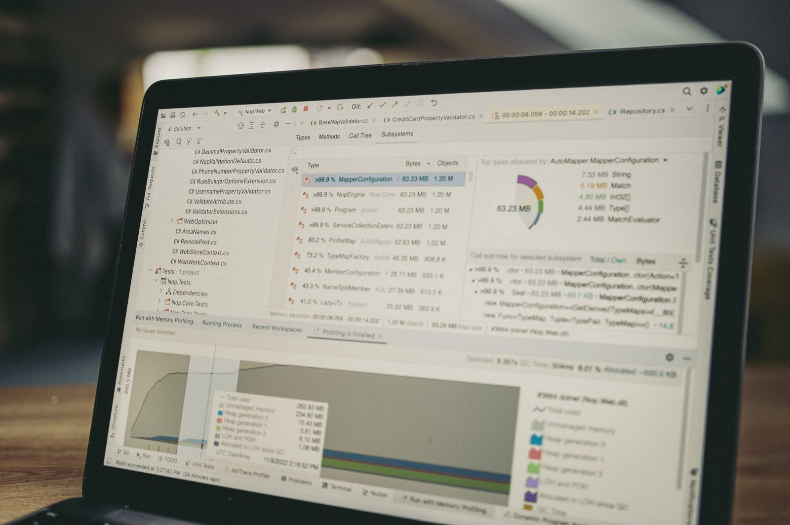 Laptop screen showing coding and data analysis, representing the practical work of AI engineering